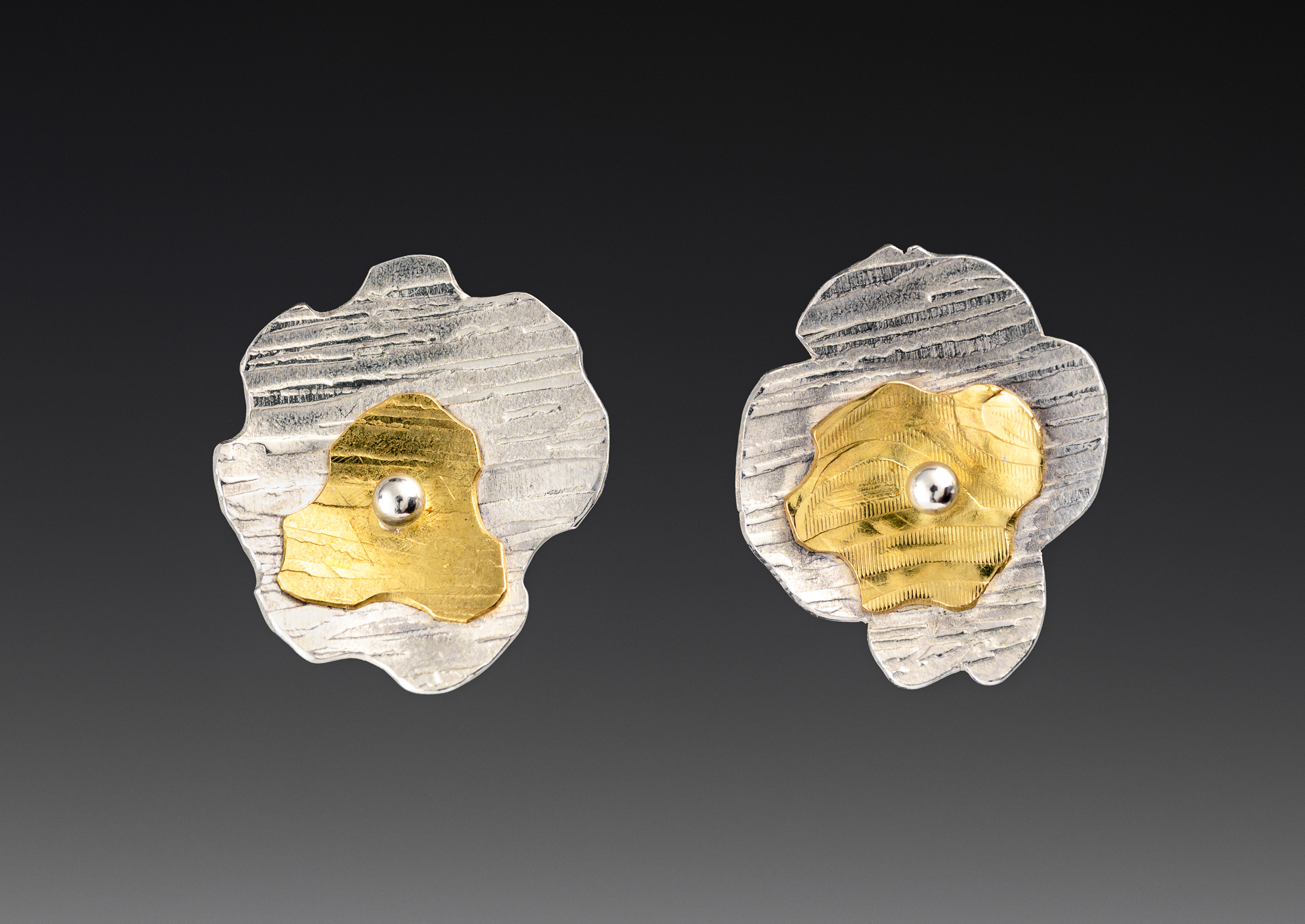 Silver and gold floral studs
